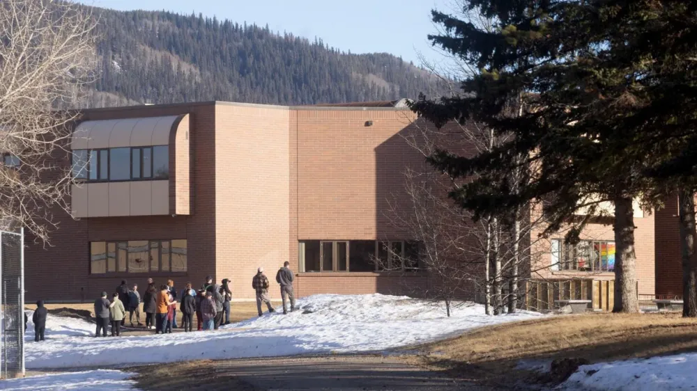 Canada school and home shootings in Tumbler Ridge leave at least nine dead, dozens wounded; suspect found dead at scene
